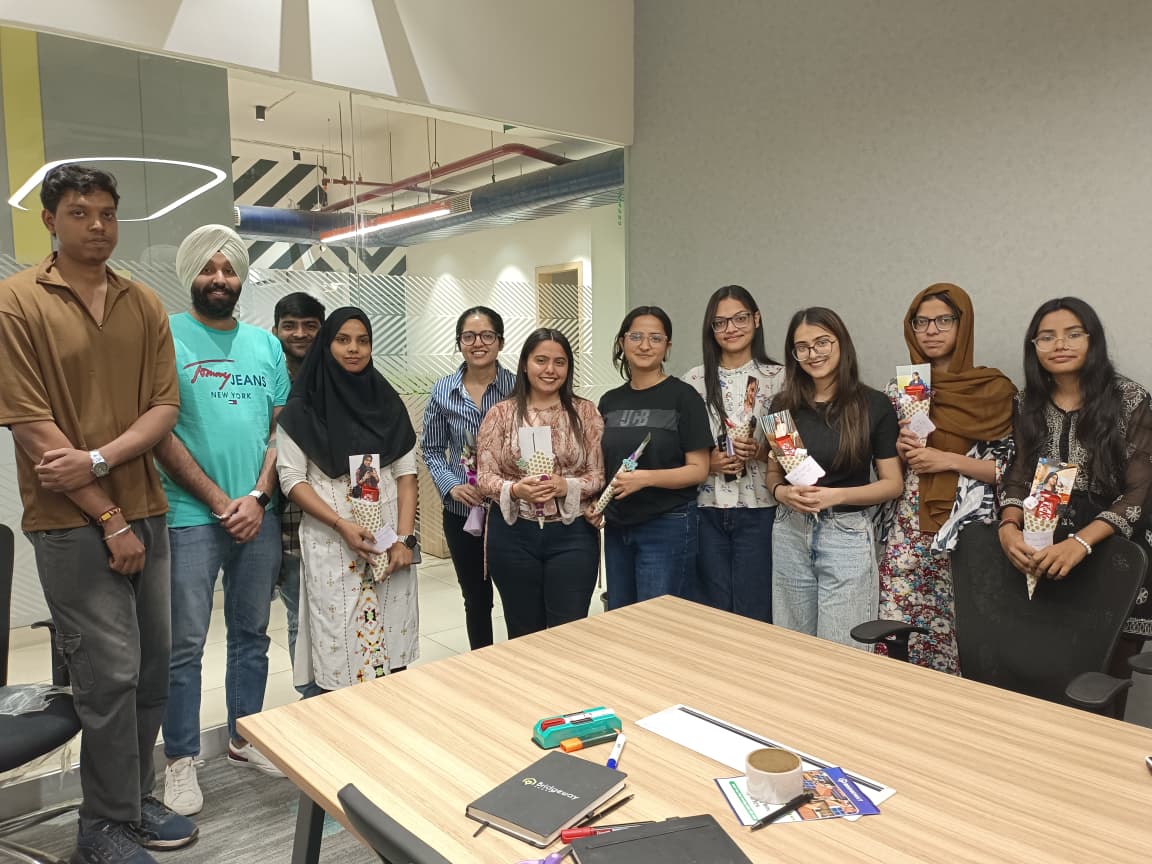 Bridgeway team celebrating a small office gifting moment